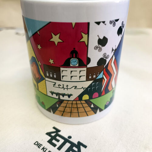 Zu gewinnen gibt es eine Popart-Tasse mit Moritzburg Zeitz von Thomas Swims